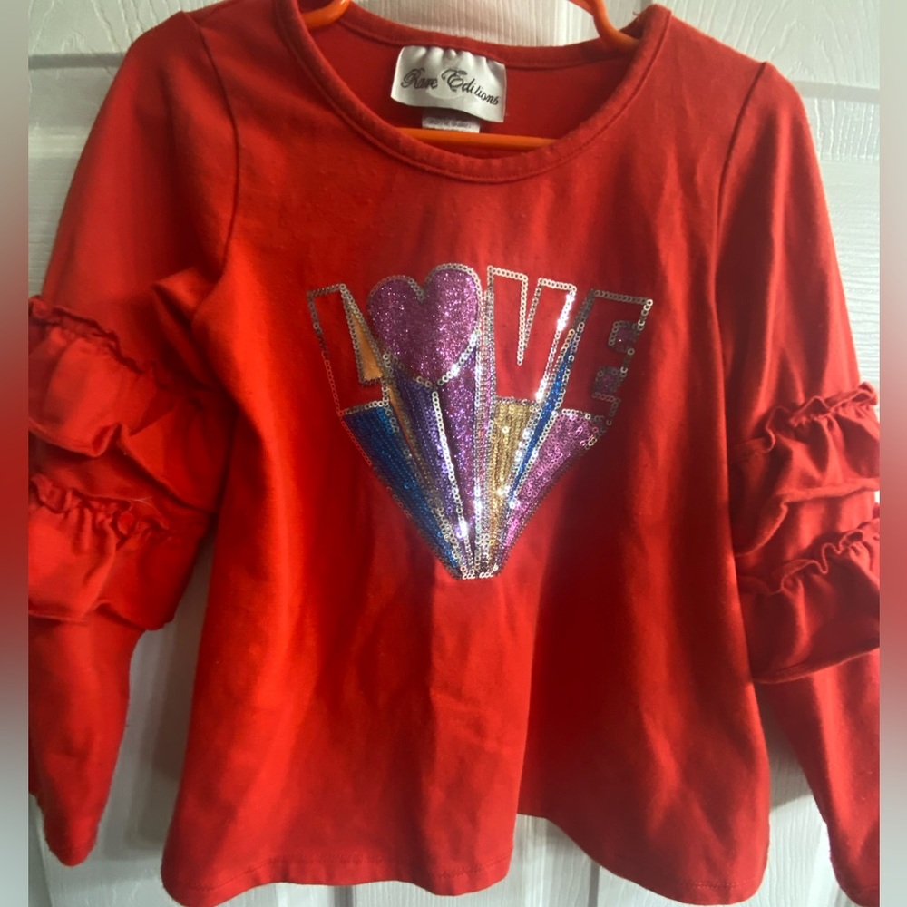 Rare Edition 4T Love shirt. Ruffled sleeves Red slight piling as shown
